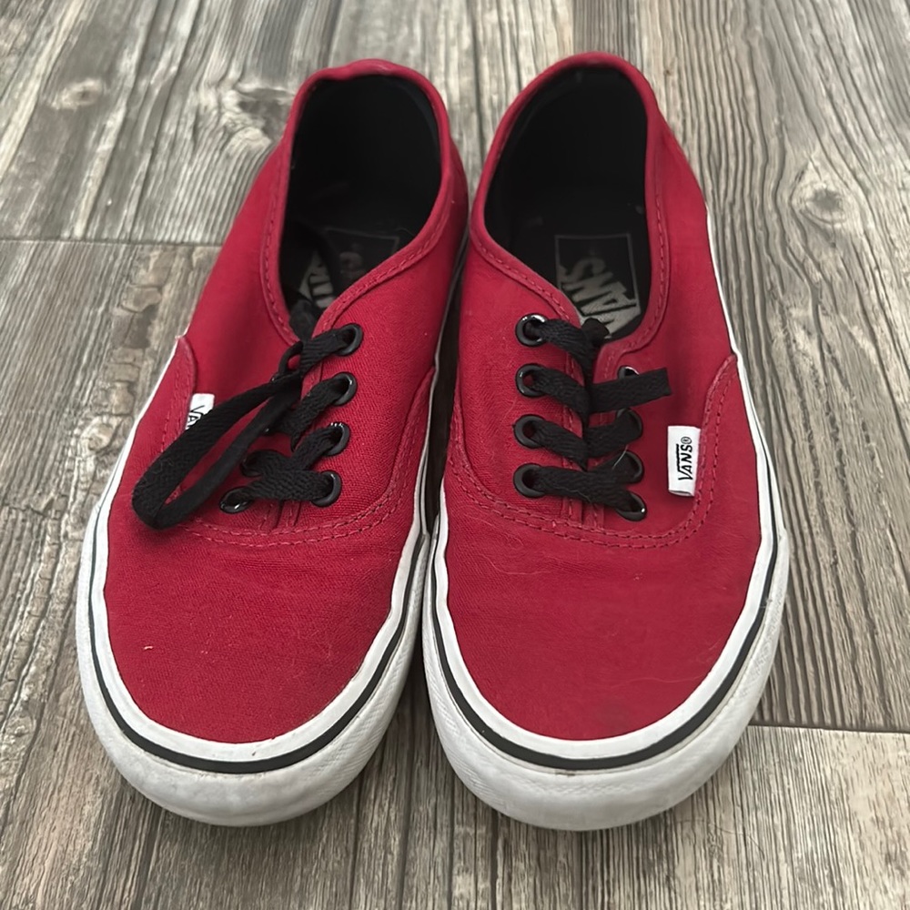 Dark red vans with black laces
